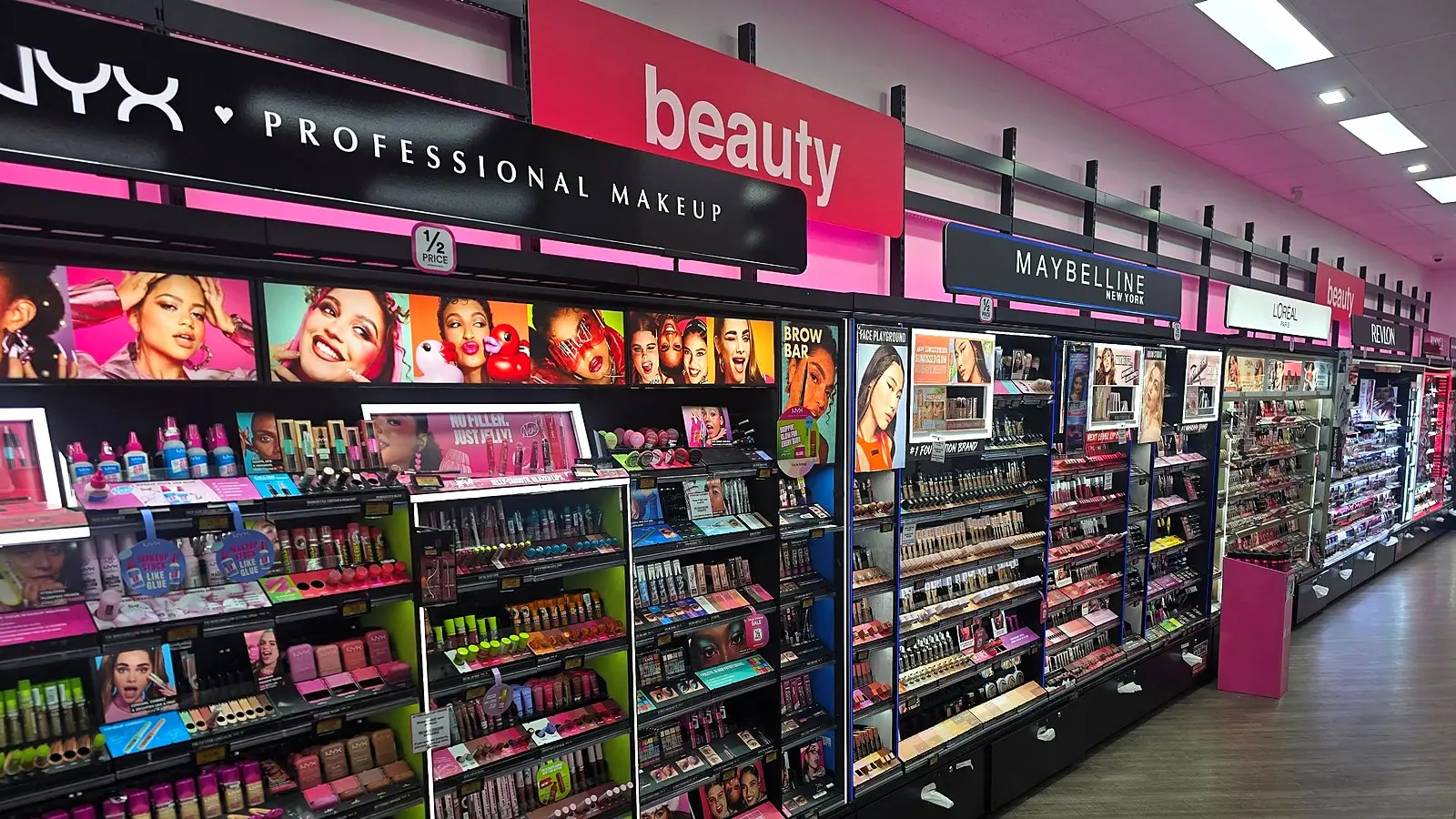 The brightly lit makeup and beauty aisle at Priceline Pharmacy Pacific Fair