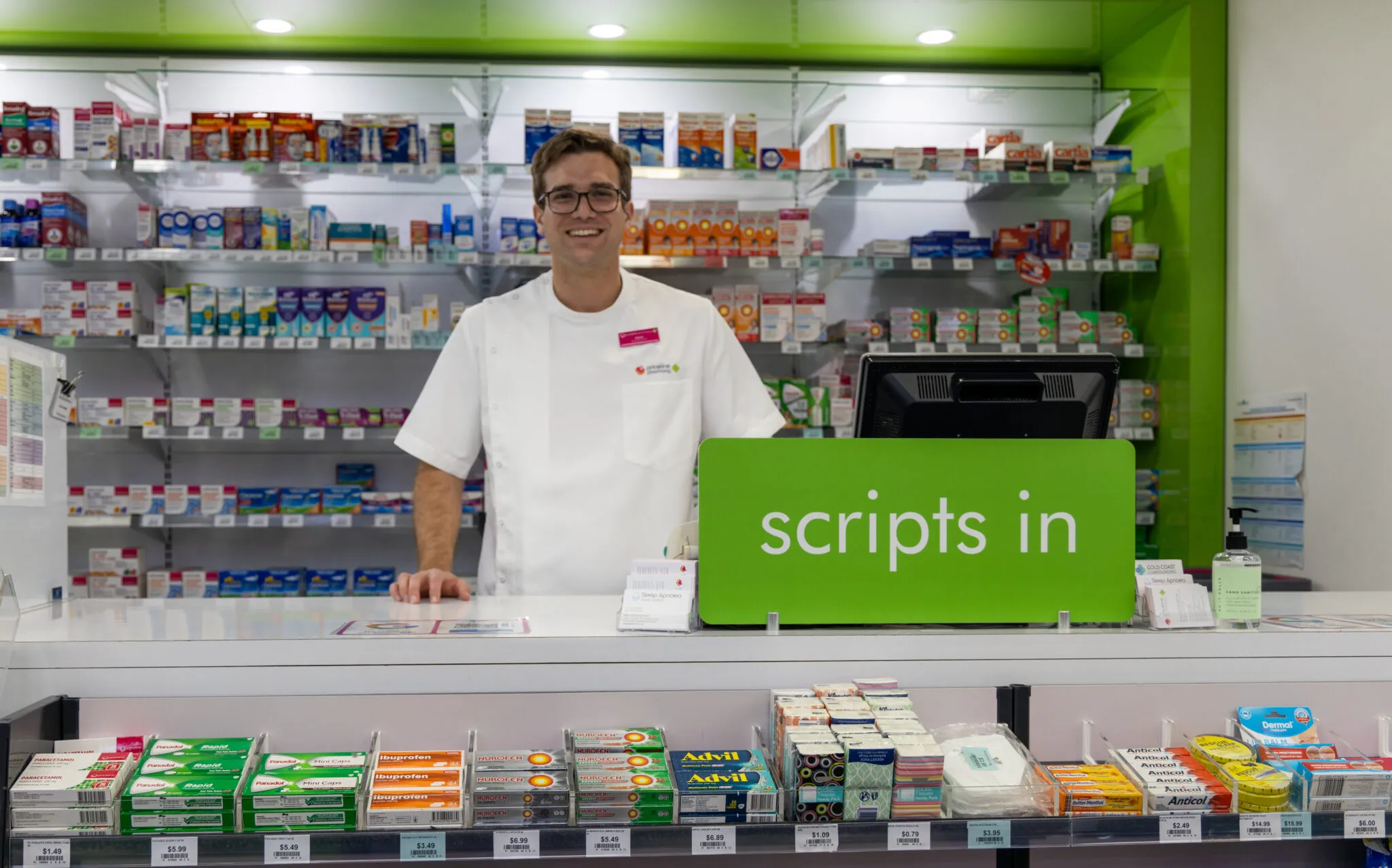 The prescription counter at Priceline Pharmacy Pacific Fair, with a pharmacist ready to take scripts